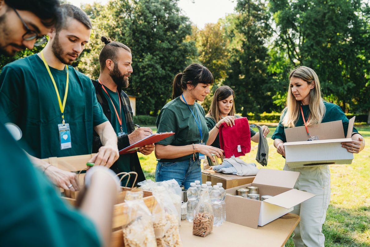 Volunteers sorting donations at a community outreach event